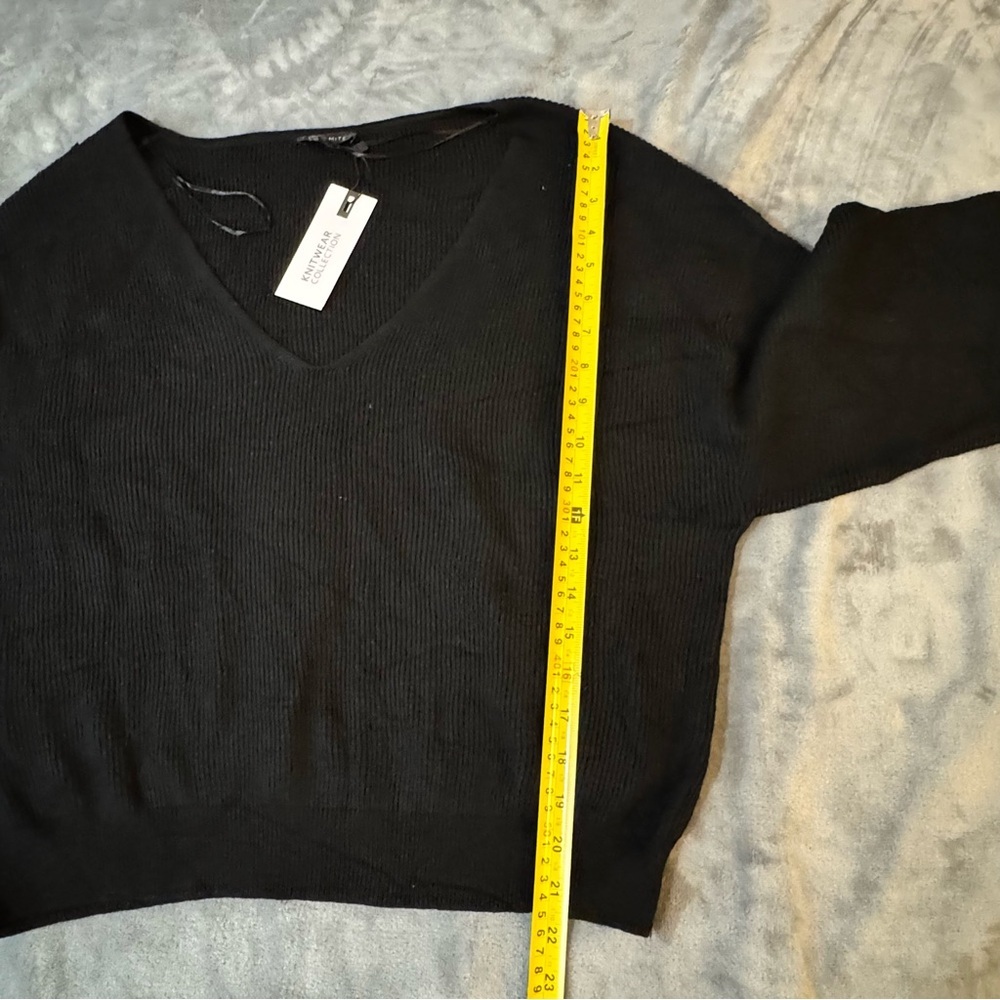 Dynamite Black V-Neck Sweater for Women
#1377 - Picture 3 of 6